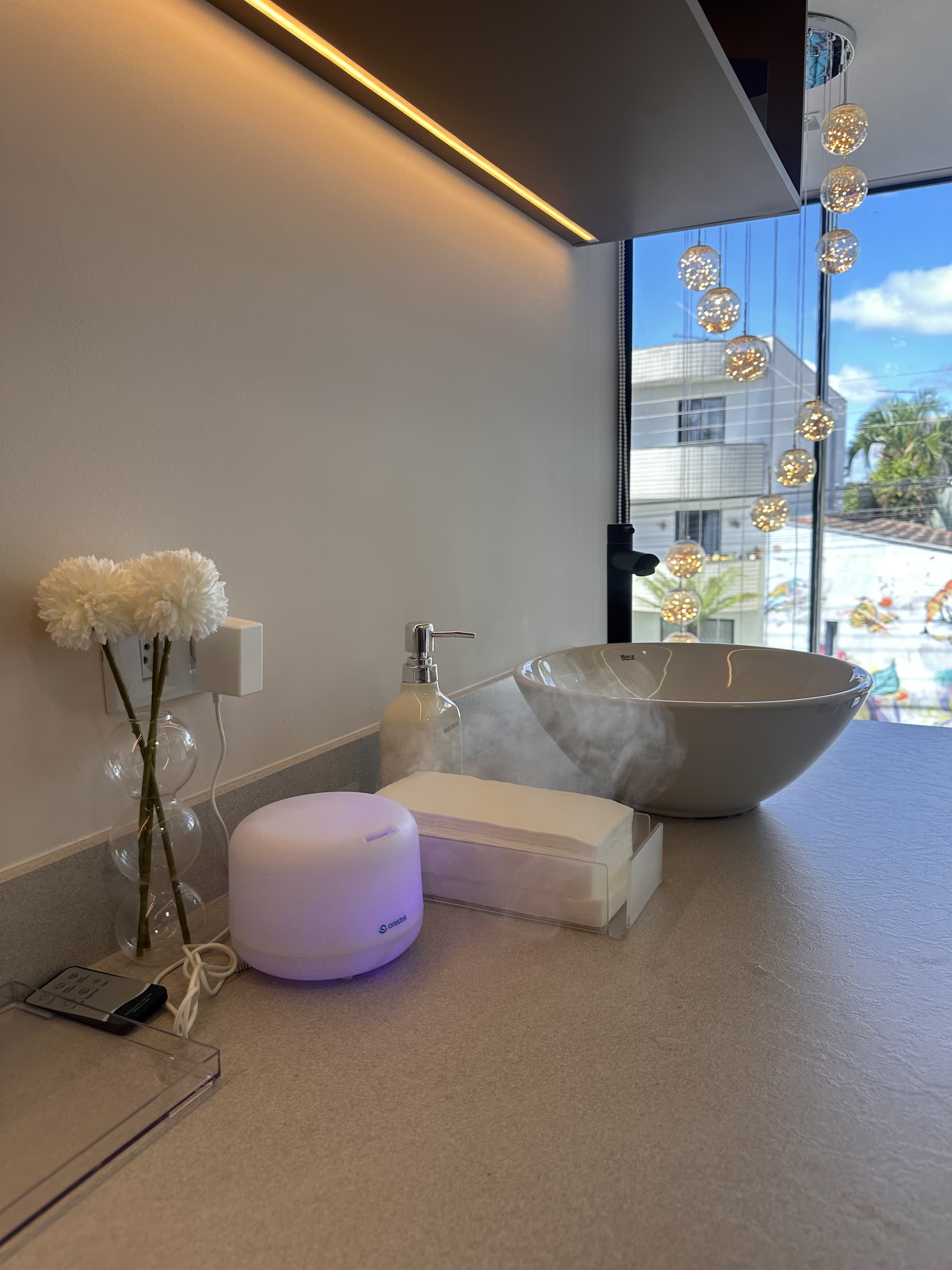Ambiente acolhedor da Nuvê, com luz suave e detalhes de cuidado